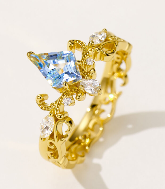 side view close up of Sterling silver gold-plated topaz crown ring
