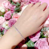 Minimalist Mini Tennis Silver Bracelet displayed on model's hand