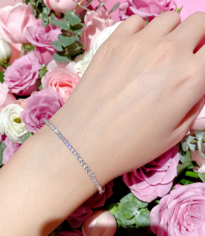 Minimalist Mini Tennis Silver Bracelet displayed on model's hand