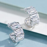 side view close-up of Sleek Sterling Silver Baguette-Cut Cubic Zirconia Huggie Hoop Earrings