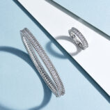 Double-Row Round-Cut Tennis-Style Sterling Silver jewelry set with a bracelet and a ring