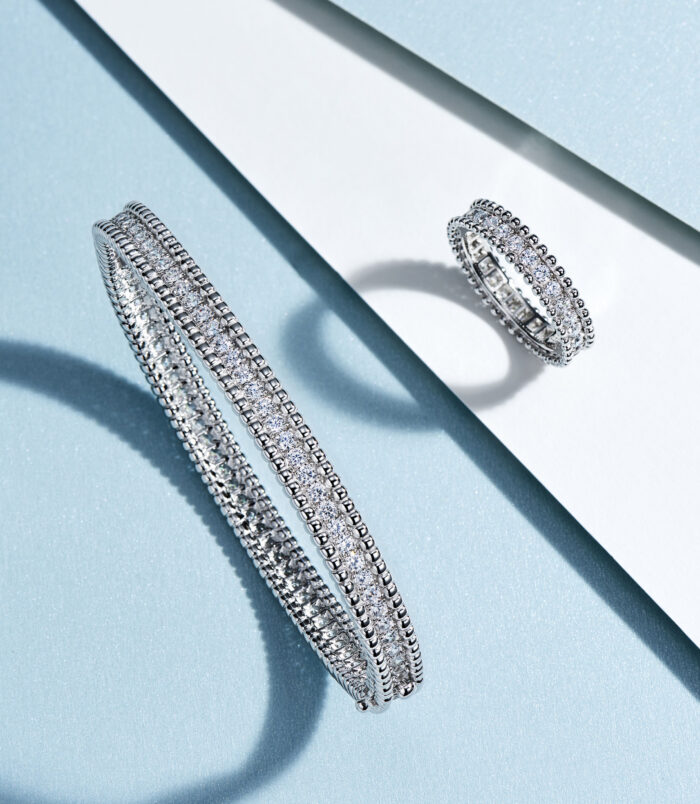 Double-Row Round-Cut Tennis-Style Sterling Silver jewelry set with a bracelet and a ring