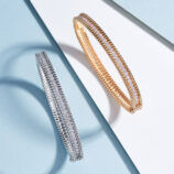 side by side comparison of Double-Row Round-Cut Tennis-Style Sterling Silver bracelet: Rhodium plated vs. rose gold plated