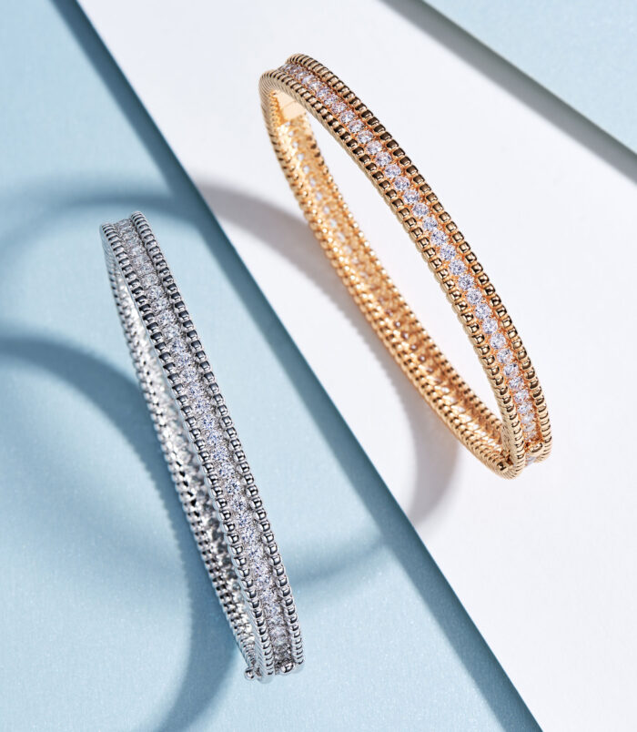 side by side comparison of Double-Row Round-Cut Tennis-Style Sterling Silver bracelet: Rhodium plated vs. rose gold plated