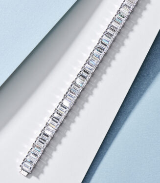 display of Classic Emerald-Cut Tennis-Style Sterling Silver Bracelet