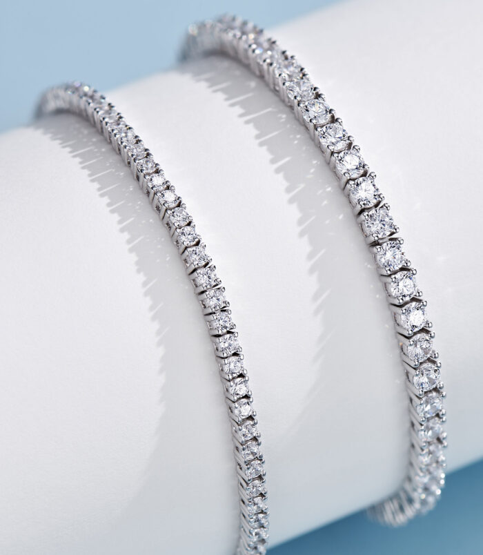 different size comparison of Round-Cut Tennis-Style Sterling Silver Bracelet:large size vs. small size