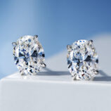 front view close-up of Classic Four-Prong Sterling Silver Stud Earrings