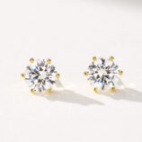 front view close-up of gold plated Classic six-prong Brilliant-Cut Sterling Silver Stud Earrings