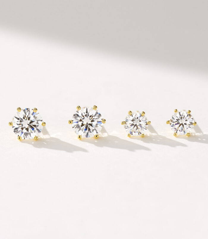 Classic six-prong Brilliant-Cut Sterling Silver Stud Earrings size comparison Classic six-prong Brilliant-Cut Sterling Silver Stud Earrings size comparison: large and small