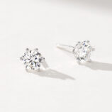 side view close-up of gold plated Classic six-prong Brilliant-Cut Sterling Silver Stud Earrings