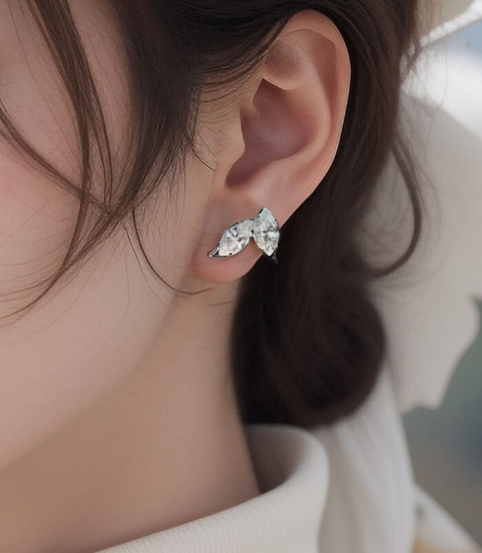 Elegant Leaf-Shaped Marquise zirconia Stud Earrings worn on a model's ear