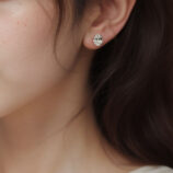 Classic Four-Prong Sterling Silver Stud Earrings model display