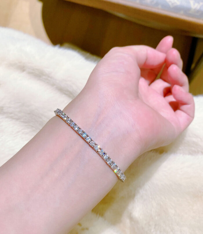 Round-Cut Tennis-Style Sterling Silver Bracelet on a wrist