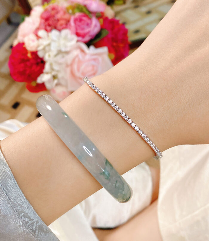 Minimalist Mini Tennis Silver Bracelet worn on model's hand