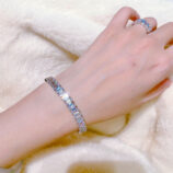 Classic Emerald-Cut Tennis-Style Sterling Silver Bracelet on a wrist