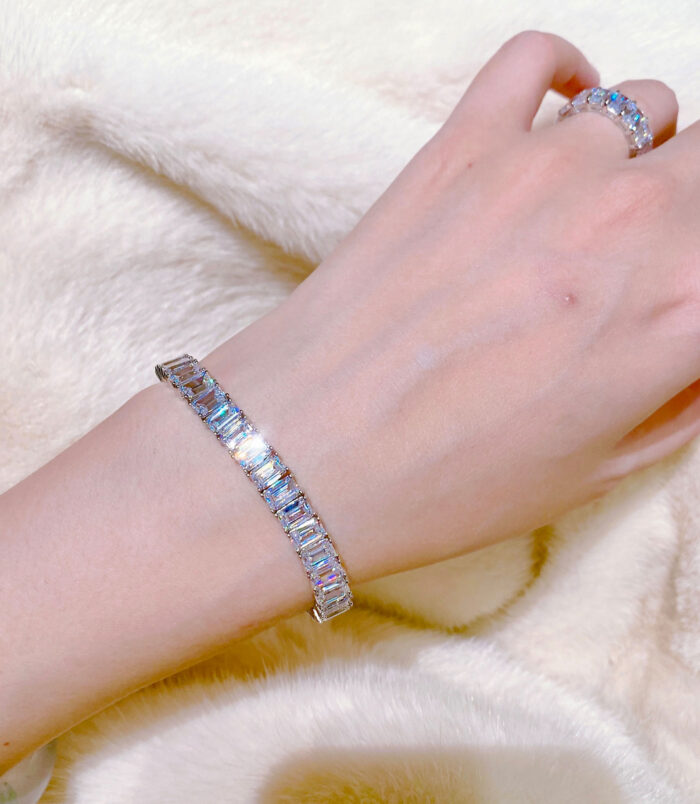 Classic Emerald-Cut Tennis-Style Sterling Silver Bracelet on a wrist