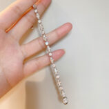 hand held close up of spliced Multi-Cut Sterling Silver Bracelet