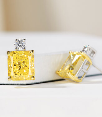 Sterling Silver Yellow Cushion-Cut Halo Stud Earrings side view side view of Sterling Silver Yellow Cushion-Cut Halo Stud Earrings