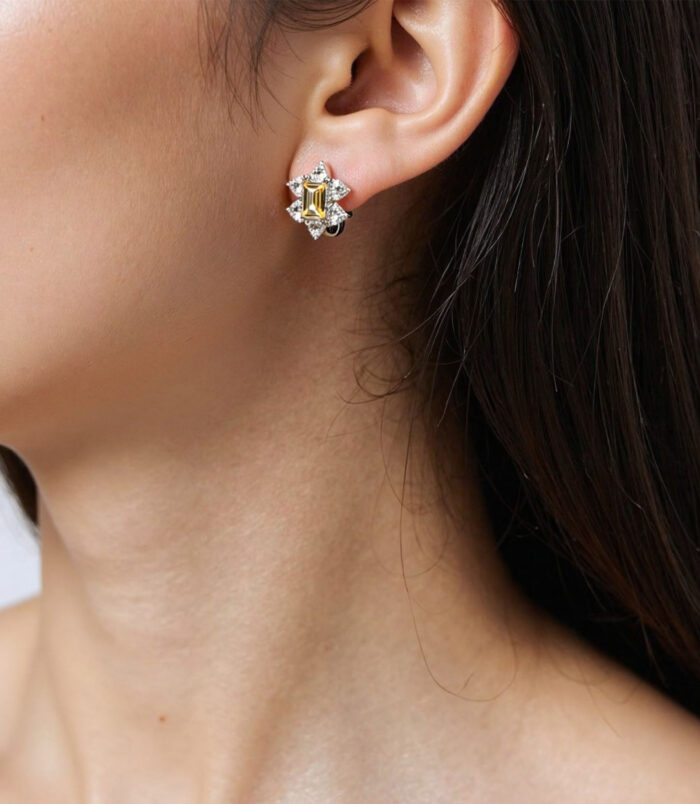 Sterling Silver Yellow Rectangular Gemstone Halo Stud Earrings on a model's ears