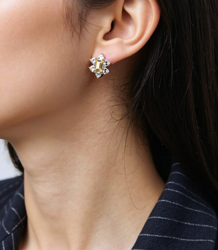 Sterling Silver Yellow Rectangular Gemstone Halo Stud Earrings displayed on a model's ear