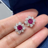 handheld close-up of Sterling Silver red flower Halo Stud Earrings