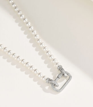 side view close-up of Sterling Silver Necklace with Pearl Strand and Zirconia Clasp