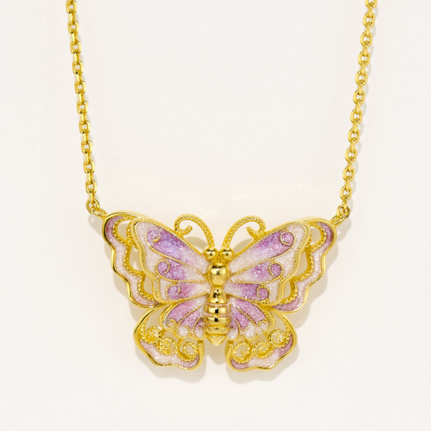 Exquisite gold-plated sterling silver butterfly necklace, featuring intricate filigree details and hand-painted pink and purple enamel on the wings, paired with a classic cable chain, creating a whimsical and feminine look perfect for adding a touch of charm to any outfit.