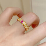 Enchanting Heart-Shaped Pink Zirconia Sterling Silver Ring worn on model's finger