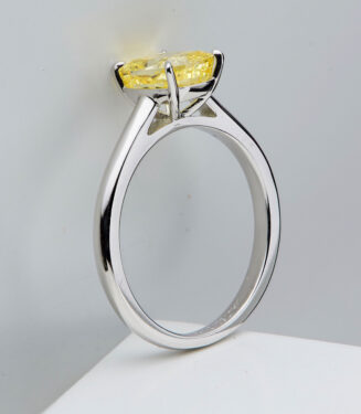 side view close-up of Cushion-Cut Yellow gemstone Sterling Silver Solitaire Ring