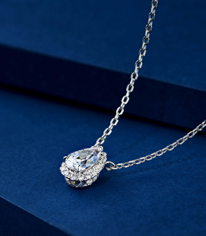 side view close-up of Sterling Silver Solitaire Halo Pear-cut Zirconia Pendant Necklace