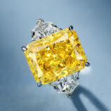 main stone close-up of Luxury Yellow Emerald-Cut Three-Stone Sterling Silver Ring