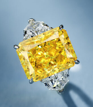 main stone close-up of Luxury Yellow Emerald-Cut Three-Stone Sterling Silver Ring