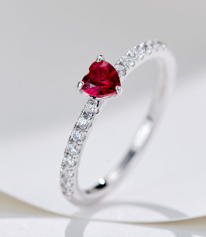 side view close-up of Enchanting Heart-Shaped Simulated Ruby Sterling Silver Ring