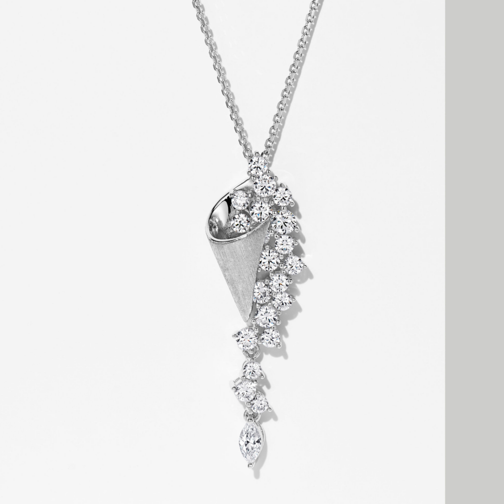 Elegant sterling silver pendant necklace, featuring a tapered cone-shaped pendant with a polished finish, adorned with a cluster of round brilliant-cut white cubic zirconia stones arranged in a cascading design, paired with a classic cable chain, creating a sophisticated and glamorous look perfect for adding a touch of luxury to any outfit.