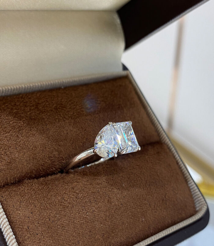 Sophisticated Two-Stone Sterling Silver Ring displayed in jewelry box
