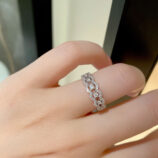 Sparkling Twisted Infinity Sterling Silver Ring worn on model's finger