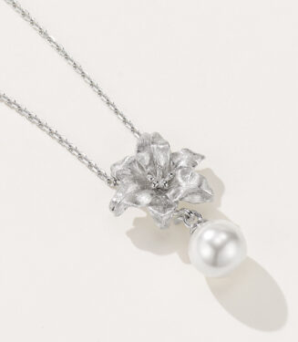 Rhodium plated Sterling Silver Flower Necklace with Pearl Drop side view side view of Rhodium plated Sterling Silver Flower Necklace with Pearl Drop