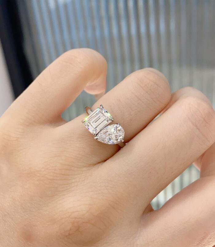 Sophisticated Two-Stone Sterling Silver Ring worn on model's finger