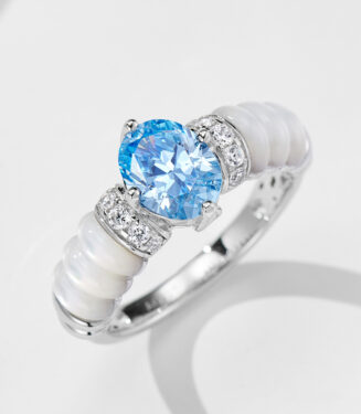 side view close-up of Oval-Cut Sky Blue Cubic Zirconia Cocktail Sterling Silver Ring