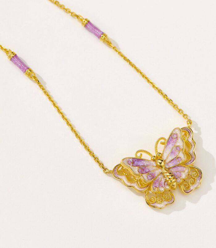 side view close-up of Sterling silver purple enamel butterfly necklace