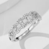 side view close-up of Sparkling Twisted Infinity Sterling Silver Ring