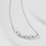 side view close-up of Sterling Silver smile Mixed-Cut Cubic Zirconia Stones Bar Necklace