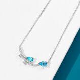side view close-up of Sterling Silver Blue Zirconia Stones and Star Accents Necklace