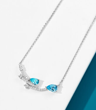 Sterling Silver Blue Zirconia Stones and Star Accents Necklace side view side view close-up of Sterling Silver Blue Zirconia Stones and Star Accents Necklace
