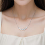 Sterling Silver Mixed-Cut Cubic Zirconia Stones Bar Necklace worn on model's neck