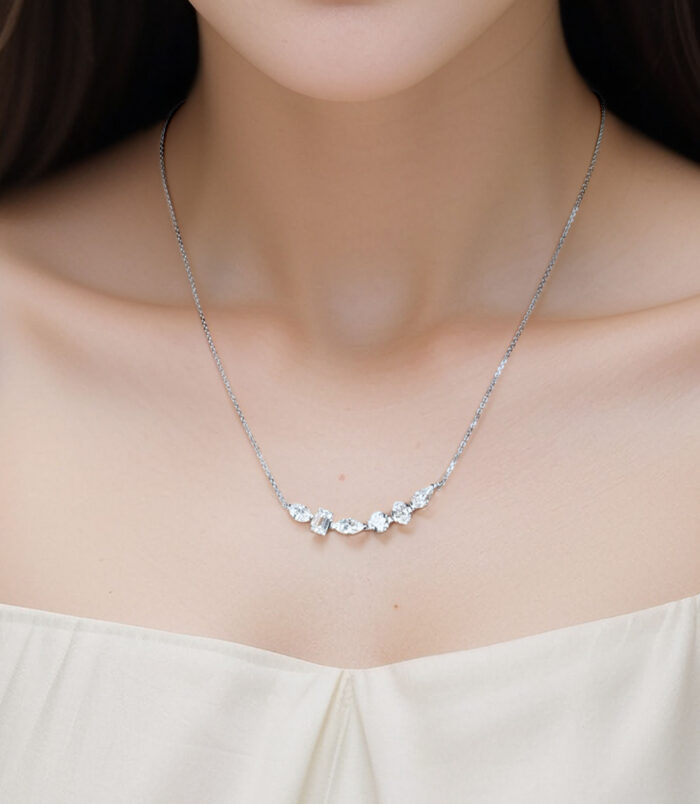 Sterling Silver Mixed-Cut Cubic Zirconia Stones Bar Necklace wearing effect Sterling Silver Mixed-Cut Cubic Zirconia Stones Bar Necklace worn on model's neck