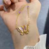 close-up of Sterling silver purple enamel butterfly necklace