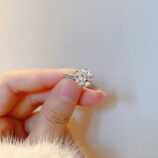 hand held close-up of Solitaire Cubic Zirconia Sterling Silver Engagement Ring