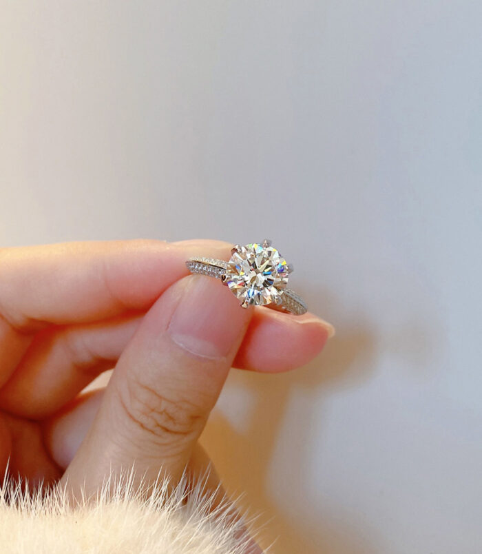 hand held close-up of Solitaire Cubic Zirconia Sterling Silver Engagement Ring