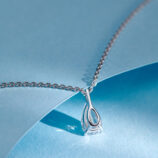 back view close-up of Sterling Silver Solitaire Pear-Shaped Zirconia Pendant Necklace